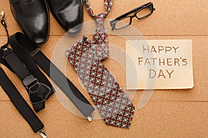 Happy Fathers Day card on cork texture background