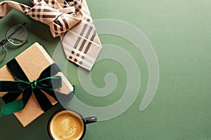 Happy Fathers Day card design. Top view gift box with green ribbon bow, glasses, tie, coffee cup on dark green background