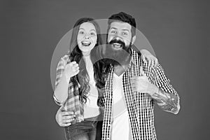 Happy fathers day. Father and daughter hug on red background. Child and father best friends. Parenthood goals. Happy