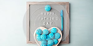 Happy fathers day greeting card with text on letter board