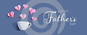 Happy fathers day message with a coffee cup and paper hearts