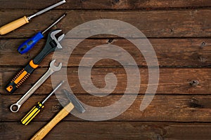 Happy Fathers Day tools, hammer on a rustic wood background. Group of repair tools on wooden background.