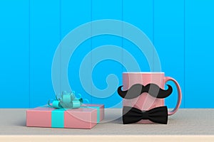 Happy Fatherâ€™s Day concept, Close up of coffee with mustache and gift box on blue wood background, Copy space