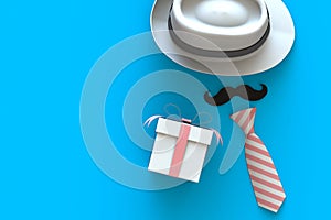 Happy Fatherâ€™s Day concept with gift box, mustache and neck tie on blue background, Top view with copy space