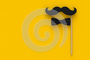 Happy Fatherâ€™s Day concept with mustache and bow tie on yellow background