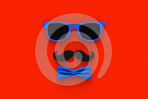 Happy Fatherâ€™s Day concept with mustache and glasses on red background, Top view with copy space
