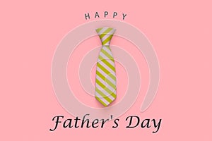 Happy Fatherâ€™s Day greeting card on pink background