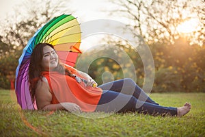 Happy fatty woman with umbrella