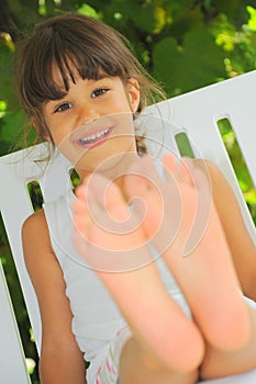 Happy feet (girl portrait) photo