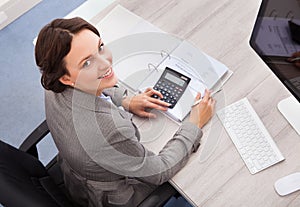 Happy female accountant photo