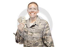Happy female airman with money