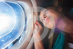 Happy, female airplane passanger photo