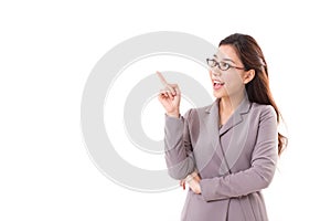 Happy female business executive, business woman pointing up