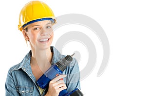 Happy Female Construction Worker Holding Cordless Drill