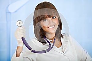 Happy female doctor with stethoscope