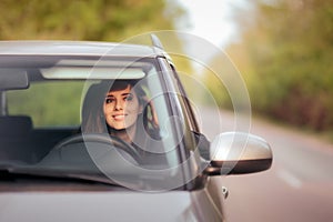Happy Female Driver on a Summer Vacation Road Trip
