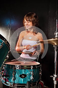 Happy female drummer