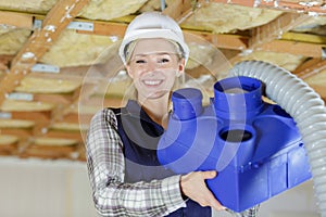 happy female engineer in construction site