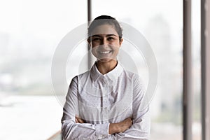 Happy female Indian business leader, executive, CEO, company owner