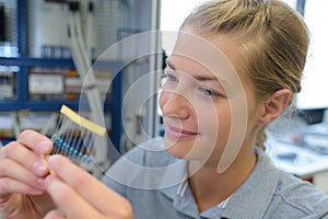 Happy female network technician