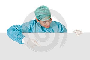 Happy Female Surgeon Holding Placard