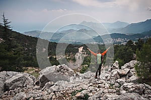 Happy female traveler having her moment in the mountains in Turk