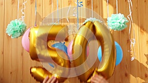 Happy fiftieth birthday with golden number fifty 50 air balloons