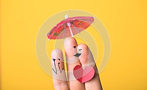 A happy finger family  in love with heart under the umbrella, valentines day
