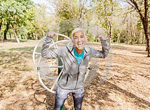 Happy Fit Successful Senior Woman Raised Arms At Outdoor Gym