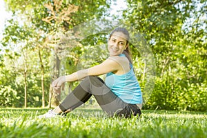 Happy fitness girl relaxing