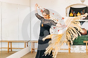 Happy flamenco woman dancer moving the manila shawl
