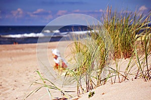 Happy free girl on sea background in summer