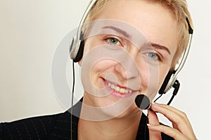 Happy friendly service agent in call centre