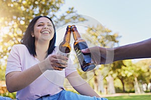 Happy friends, beer and toast in celebration at the park for holiday, summer and freedom to travel together. Smile of