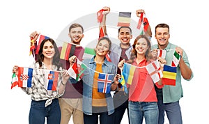 Happy friends with flags of different countries