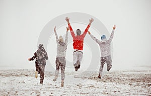 Happy friends friendship run jump first snow