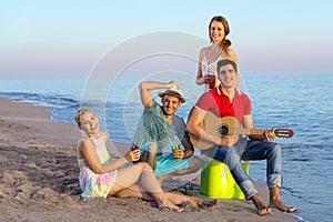 Happy Friends Relaxing at the Beach