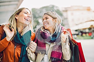 Happy friends shopping.