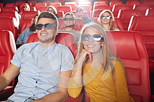 Happy friends watching movie in 3d theater