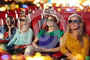 Happy friends watching movie in 3d theater