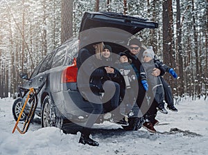 Happy and funny family of three boys and their two parents