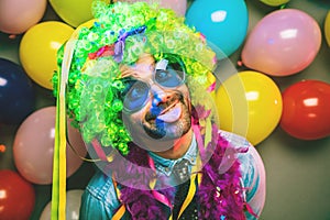 Happy Funny man at carnival Party dancing man