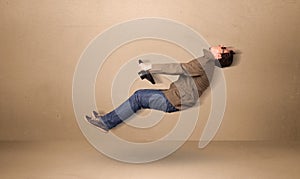 Happy funny man driving a flying car concept