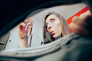 Happy Funny Woman Fining Her Keys in Messy Purse