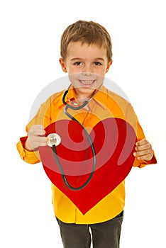 Happy future doctor examine heart