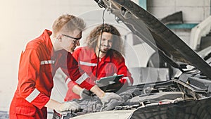 happy garage mechanic teamwork male worker check service maintenance auto vehicle engine auto tuning