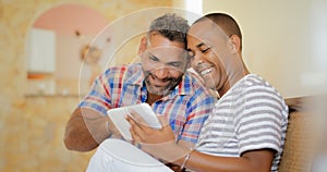 Happy Gay Couple Homosexual People Men Using Tablet photo