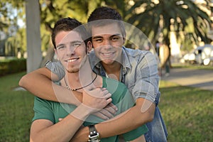 Happy gay couple outdoors