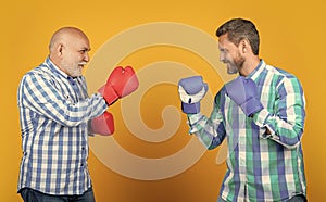 happy generation men boxing in studio. generation men boxing on background.