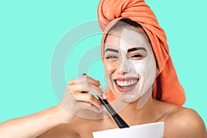 Happy girl applying daily facial cream - Young woman having skin care spa day - Healthy beauty clean treatment